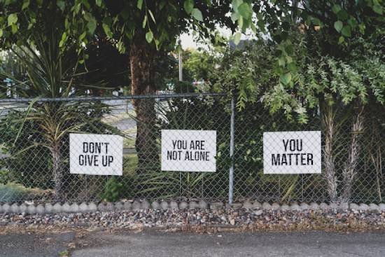 Encouraging words can remind us that we're not alone. This could be why people sometimes put up signs that say things like, "Don't give up."