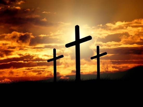 Silhouette of crosses at dusk representing a new identity in Christ Jesus.