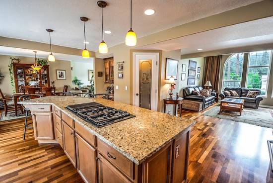 Home interiors with open kitchen and a generous supply of natural light.