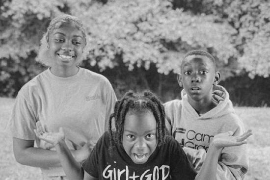 A hungry kid complaining refusing to wait any longer.