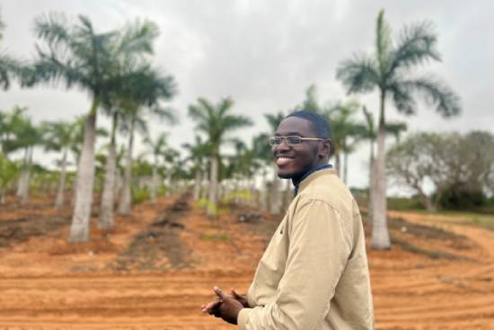 A smiling single man spending time on his farm.