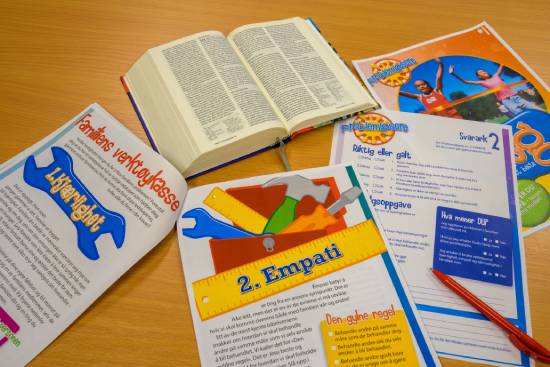 n assortment of bible study materials for different age groups.