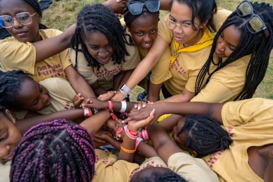 A group of pathfinders doing community service during a camporee.