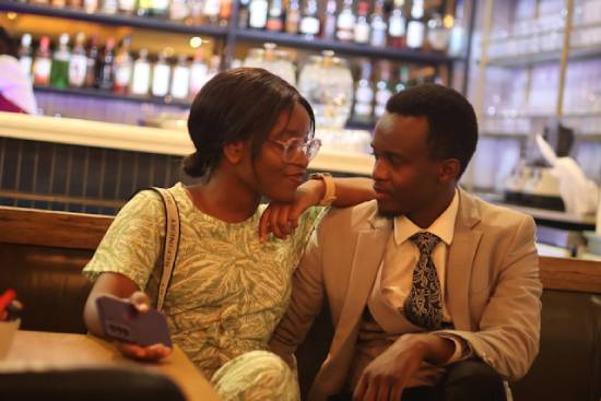 A Couple on a Dinner Date A couple having safe conversations during dinner date in a restaurant.