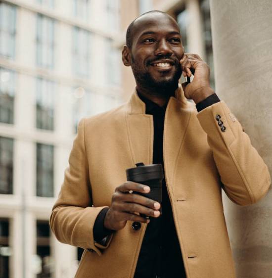 A Mna Making a Phone Call A man making a call to try reach out to the people he care about.
