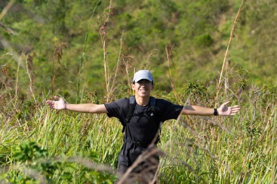 A man out to discover a new hobby is ready to go hiking.