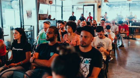 A keen audience attentively following a presentation.
