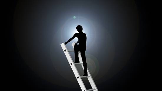 Silhouette of a person climbing the ladder against fear and regret.