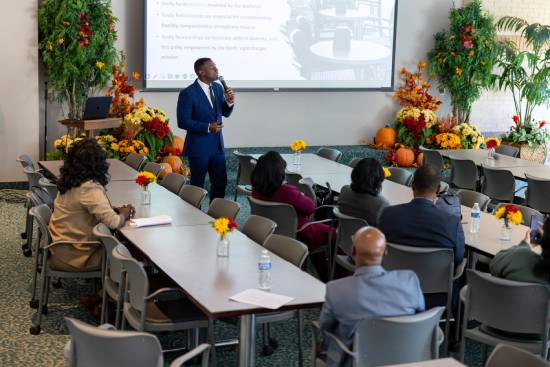 Presentation on Biblical Principles for Expressing Love A pastor delivering a presentation on Biblical principles for expressing love and concern