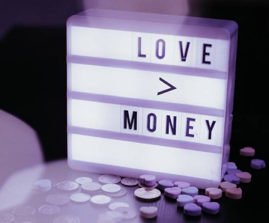 Love Money Symbol A 'love money' symbol surrounded by coins and heart icons.